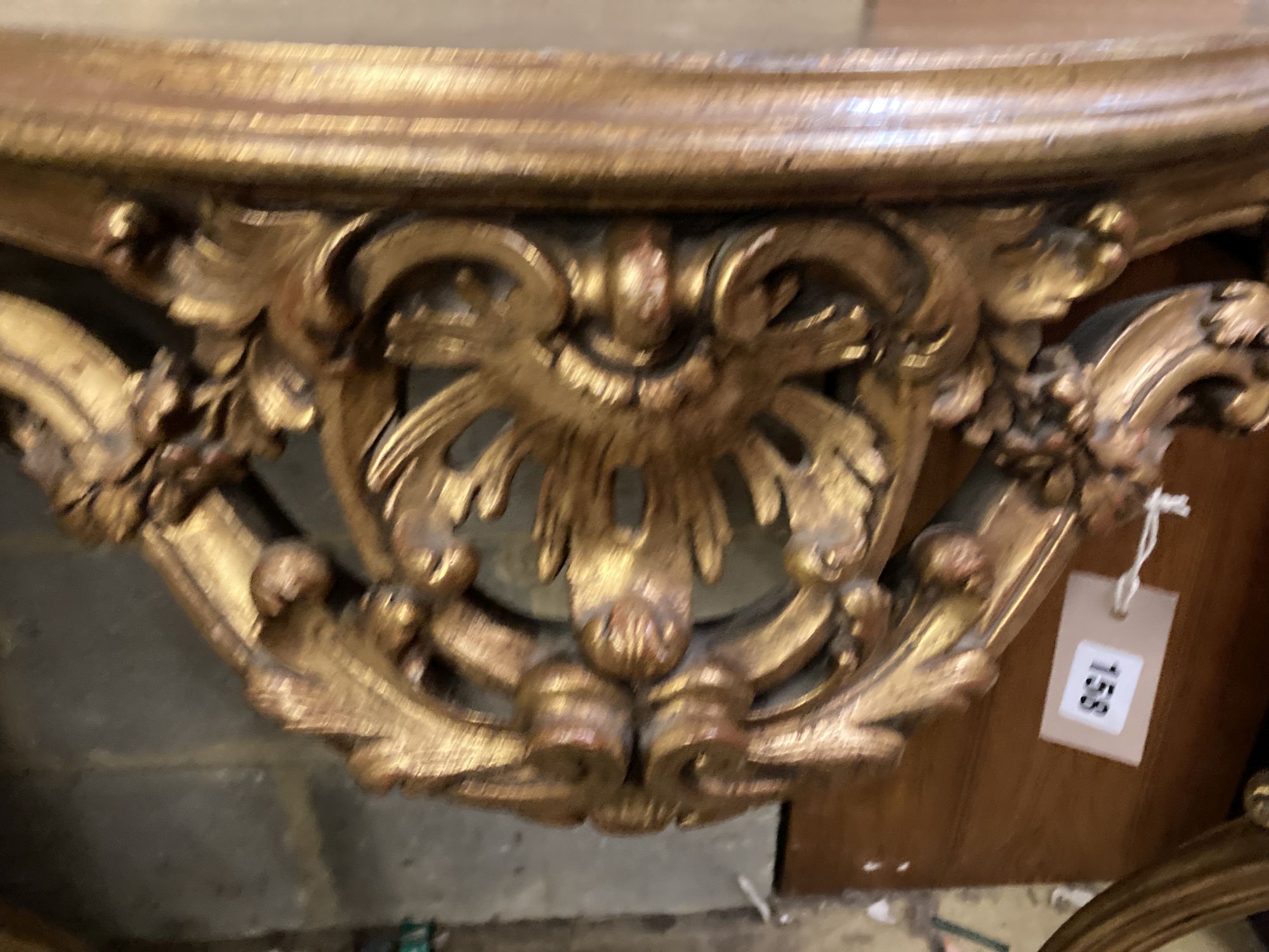 A Louis XV style carved giltwood serpentine console table, width 120cm, depth 50cm, height 89cm